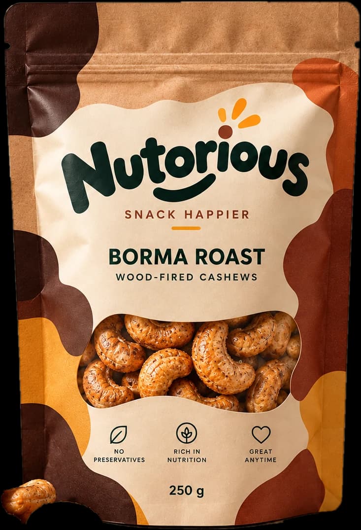 Nutorious Borma Roast wood-fired cashews 250 g pouch beside charred wood
