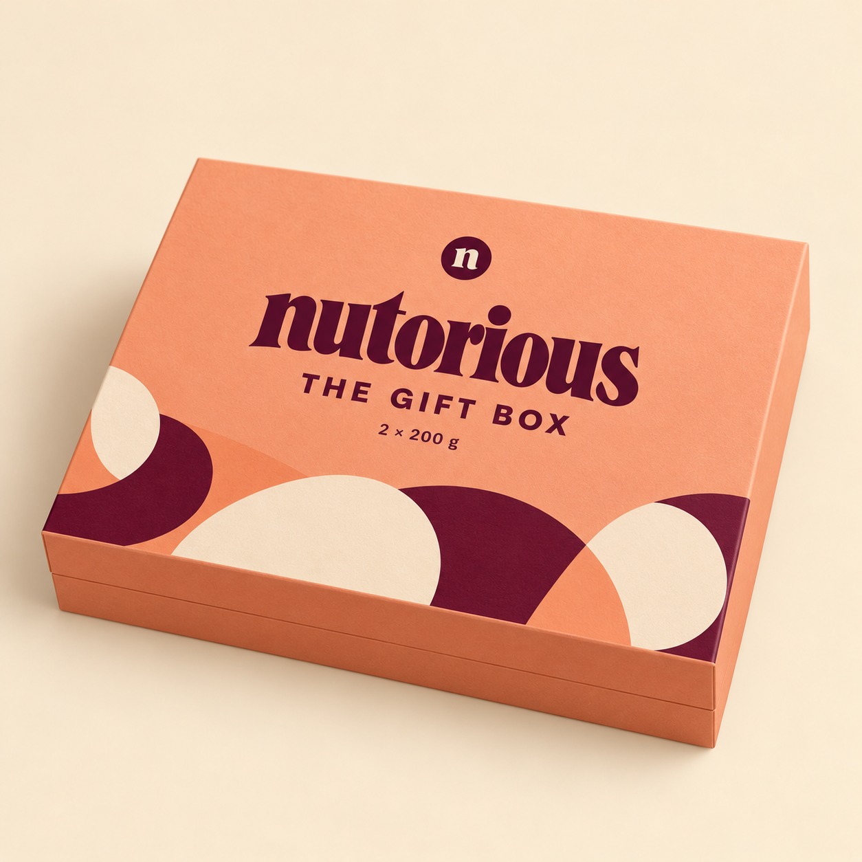 Closed peach Nutorious gift box containing two 200 g pouches.