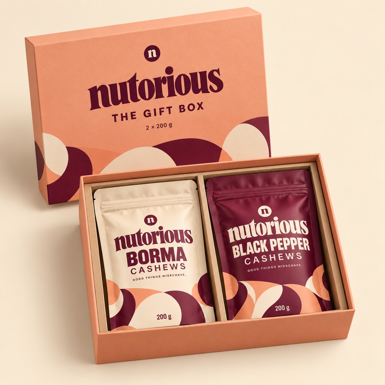 Open Nutorious gift box containing one Borma and one Black Pepper pouch, 200 g each.